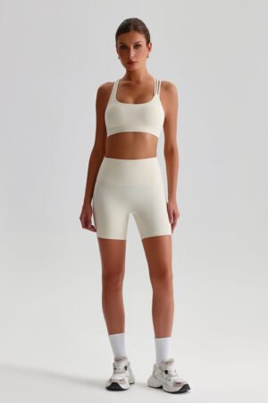 Women Naked Sensation Yoga Shorts Set: Cross-Back Bra + High-Waisted Sculpting Shorts